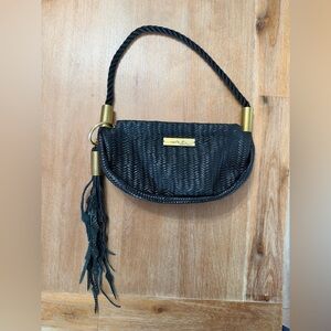 Wildwood Oyster Co. Clamshell Bag in black basketweave with tassel
